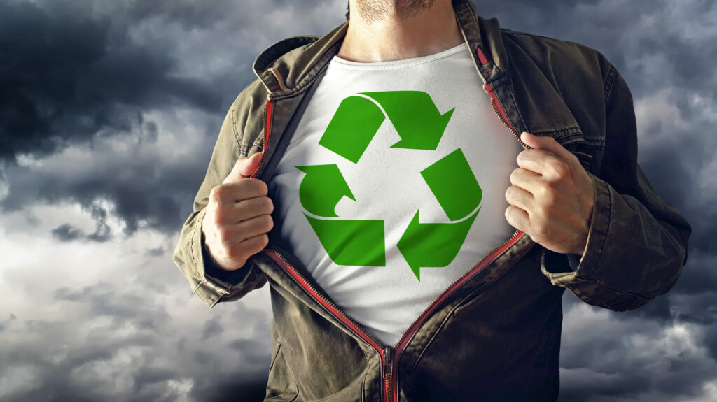 Man stretching jacket to reveal shirt with recycle symbol printe